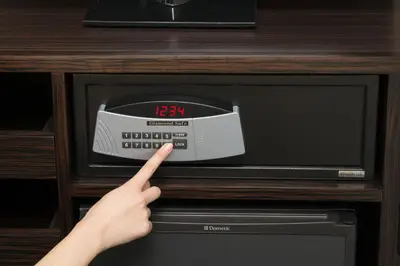 a person pointing to a clock in a microwave at HOTEL Guest1 Ueno Ekimae in Tokyo