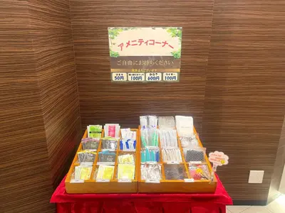 a table with many books on it in a room at HOTEL Guest1 Ueno Ekimae in Tokyo