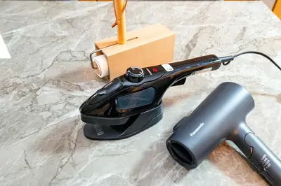 a hair dryer sitting on top of a counter at Za086 \u67cf\u539f\u30d3\u30eb101 in Tokyo