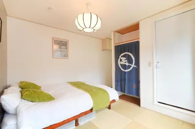 a bedroom with a white bed and a window at Monthly Stay Furnished Apartment \u6c60\u888b\u99c5\u5f92\u6b69 5\u5206 Mejiro Yasu Hotel in Tokyo