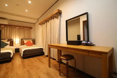 a bedroom with a desk with a mirror and a bed at Nakai House!! Tokyo Home near Shinjuku - Groups & Families in Tokyo