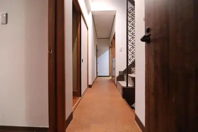 a corridor of a hallway with a long hallway at Nakai House!! Tokyo Home near Shinjuku - Groups & Families in Tokyo