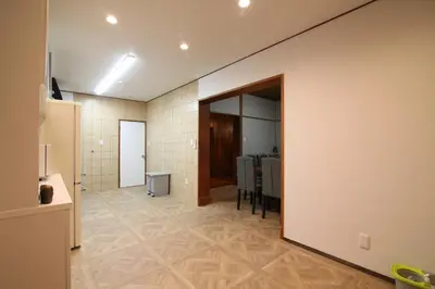 a living room with a table and a mirror at Nakai House!! Tokyo Home near Shinjuku - Groups & Families in Tokyo