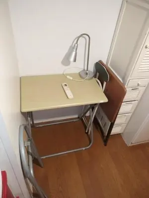 a desk with a lamp on top of it at 130Ｍ2 Entire House Max 12 Guests Entire House 5 min to Ikebukuro Perfect for Groups & Families in Tokyo