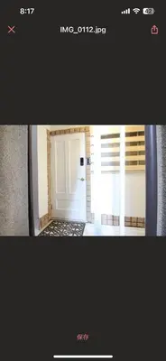a picture of a hallway with a white door at 130Ｍ2 Entire House Max 12 Guests Entire House 5 min to Ikebukuro Perfect for Groups & Families in Tokyo