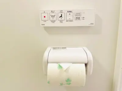 a roll of toilet paper hanging on a wall at Z5-Shinjuku center 4 mins to ST Max 3P-\u65b0\u5bbf\u6700\u4e2d\u5fc3 \u6771\u65b0\u5bbf\u99c54\u5206 \u76f4\u8fbe\u65b0\u5bbf \u6e0b\u8c37 \u8868\u53c2\u9053 \u6c60\u888b \u4e0a\u91ce \u4ee3\u4ee3\u6728 \u9280\u5ea7 \u539f\u5bbf in Tokyo