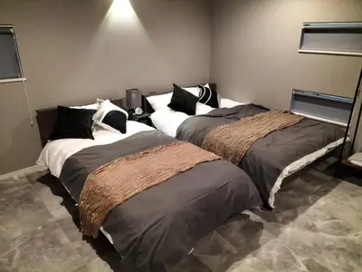 a room with three beds in a room at 103, Higashi-Yotsugi 3A, Entire house for rent, \u6771\u56db\u3064\u67283A in Tokyo