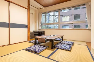 a large room with a table and some seats at \u5165\u82392\u4e01\u76ee\u6238\u5efa\u3066 in Tokyo