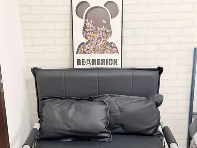 a sign above a bed in a room at S6 Shibuya center-350m from Shibuya st ation in Tokyo