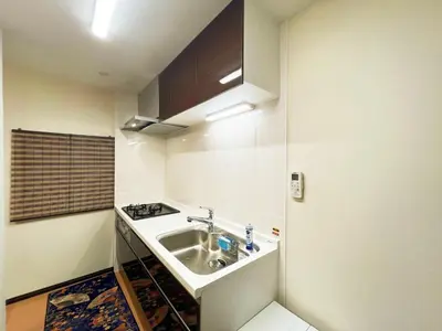 a small kitchen with a sink and a stove at Zen House - Vacation STAY 18298 in Tokyo