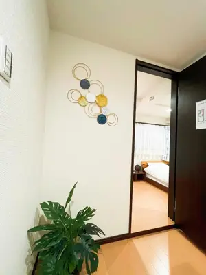 a mirror in a room with a bedroom at Zen House - Vacation STAY 18298 in Tokyo
