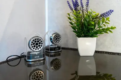 a glass table with two hair dryers and a potted plant at Boasorte Urayasu in Tokyo