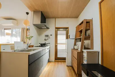 a kitchen with a sink and a refrigerator at Shibuya 5Bedroom Private Villa 2Bath 2WC Up to 14 Guests in Tokyo