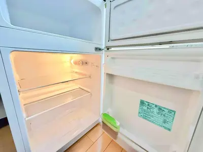 an open refrigerator with its door open and a drawer at \u6c60\u888b Aurora 7 in Tokyo