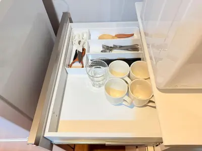 a refrigerator filled with cups and utensils at NC-302Yamanote Line shinjuku \u9ad8\u7530\u99ac\u5834 5mins walk Hostel! \u9ad8\u901fWi-fi! Waseda in Tokyo