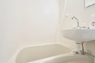a white bathroom with a sink and a tub at ND-307Yamanote Line shinjuku \u9ad8\u7530\u99ac\u5834 5mins walk Hostel!\u9ad8\u901fWi-fi! Waseda in Tokyo