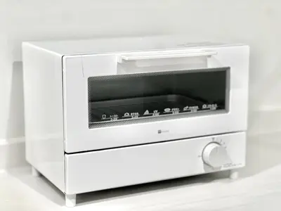 a white microwave oven sitting on top of a counter at Sugamo 3F-TS0336 in Tokyo
