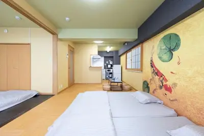a bedroom with a large bed in a room at \u5409\u7965\u5929 in Tokyo
