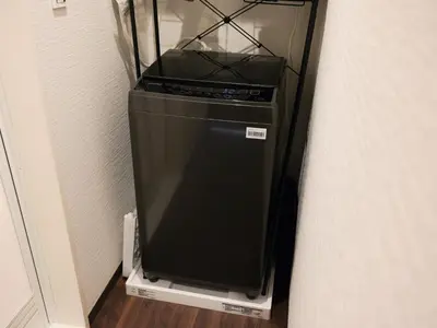 a black computer in a corner of a room at mori HOUSE-vacation rental in Tokyo
