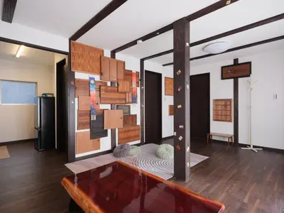 a living room with a couch and a table at mori HOUSE-vacation rental in Tokyo