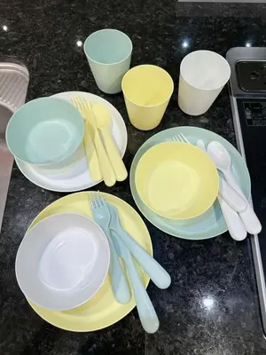 a table with plates and utensils on a counter at Worldtraveler Roppongi in Tokyo