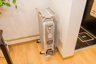 an air conditioner in the corner of a room at Aurora1 in Tokyo