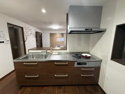 a kitchen with a sink and a stove at \u98a8\u82b1Fuka\u6c11\u6cca\u5927\u68ee\u897f002 in Tokyo