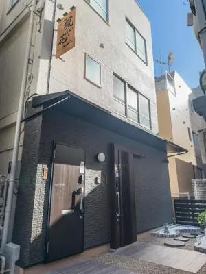 a building with a door in front of it at \u98a8\u82b1Fuka\u6c11\u6cca\u5927\u68ee\u897f002 in Tokyo