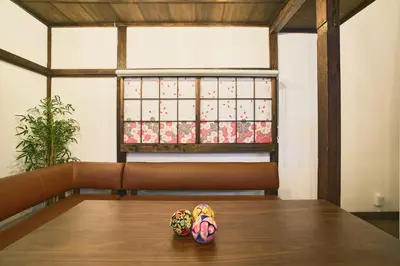 a table with two donuts sitting on top of it at \u548c\u6c23\u4f1a\u3005\u66f3\u821f Wakiaiai Hikihune in Tokyo