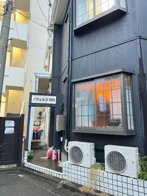 a building with two air conditioners outside of it at UT Apart Ikebukuro \u6c60\u888b\u99c5\u5f92\u6b6910\u5206 in Tokyo