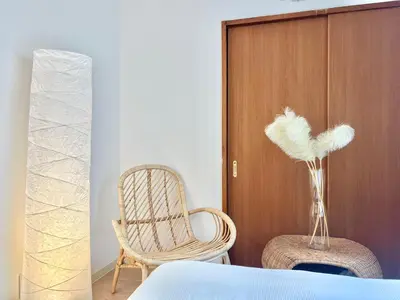 a bedroom with a bed and two chairs and a cabinet at shinjuku yichun hostel-SJ0399 in Tokyo