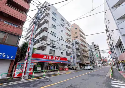 a street in an asian city with buildings at 9th floor Elevator Yamanote Line Komagome Station 3 mins walk 3 rooms 1 room 1 room Direct access to Shinjuku Ueno Akihabara Ginza Tokyo Ikebukuro Shinjuku Shibu in Tokyo