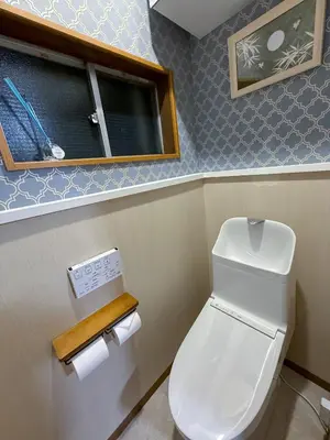 a bathroom with a white toilet in a room at \u98a8\u82b1Fuka\u6c11\u6cca\u5927\u68ee\u897f001 in Tokyo