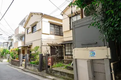 an old box is sitting in front of a building at Roopt\u795e\u697d\u5742 in Tokyo