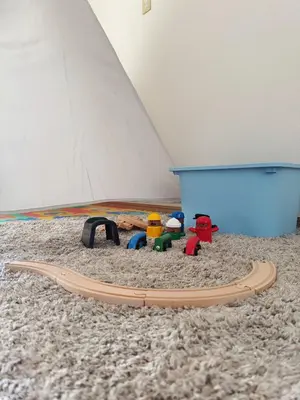 a pile of toys on the floor of a room at \u4e0a\u91ce\u5708\u5f92\u6b65\u516c\u5bd3\u578b\u9152\u5e97 \u4e0b\u8c37\u99c5\u304b\u3089\u5f92\u6b653\u5206 in Tokyo