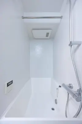a white bathroom with a shower and a sink at Natsumezaka Room1 NM1 in Tokyo