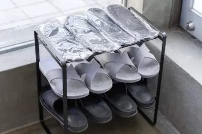 a shelf with plates and other dishes on it at Natsumezaka Room1 NM1 in Tokyo
