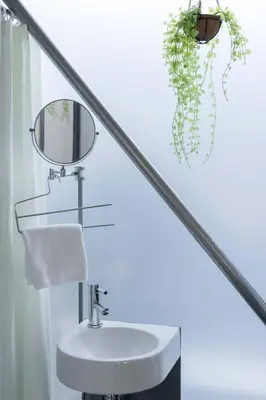 a bathroom with a sink and a mirror at Natsumezaka Room1 NM1 in Tokyo