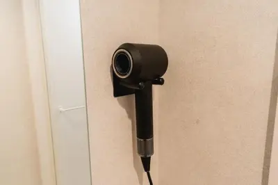 a security camera is attached to a wall at Guesthouse Akasaka in Tokyo