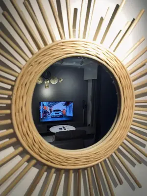 a mirror reflecting a living room with a tv at Alo BnB 9 - Near ROPPONGI, GINZA, SHINJUKU, SHIBUYA - Self check-in in Tokyo