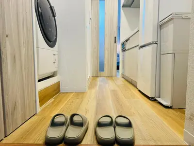 a room with two pairs of slippers on the floor at Shinjuku Kabukichō-4F-SJ0013 in Tokyo