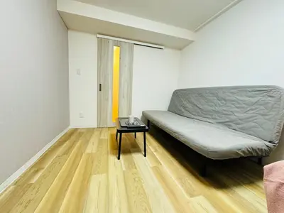 a bedroom with a bed and a table at Shinjuku Kabukichō-4F-SJ0013 in Tokyo