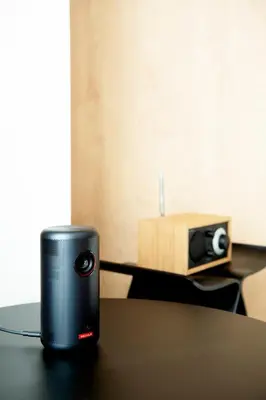 a speaker sitting on top of a table at Zen apartment in central Tokyo in Tokyo