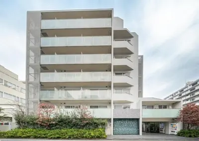 an apartment building with a parking lot in front of it at Pangoo Shinagawa Room 204 - Vacation STAY 98612v in Tokyo