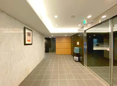 a hallway of an office building with a glass door at Pangoo Shinagawa Room 303 - Vacation STAY 99296v in Tokyo