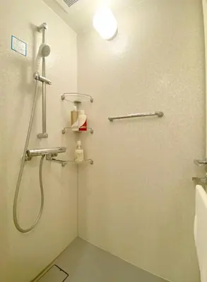 a bathroom with a shower and a sink and a toilet at Pangoo Shinagawa Room 304 - Vacation STAY 18366 in Tokyo