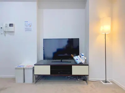 a flat screen tv sitting on top of a table at Pangoo Shinagawa Room 406 - Vacation STAY 18375 in Tokyo
