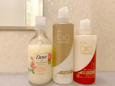 two bottles of detergents sitting on a bathroom counter at Pangoo Shinagawa Room 601 - Vacation STAY 00052v in Tokyo