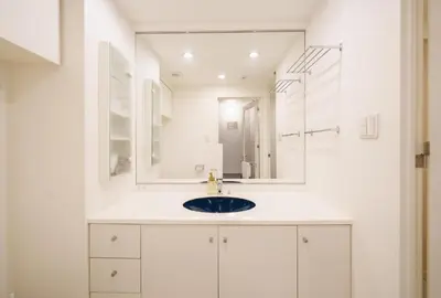 a bathroom with a sink and a mirror at angoo Shinagawa Room 603 - Vacation STAY 00071v in Tokyo