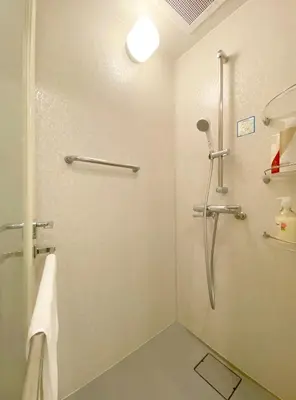 a bathroom with a shower with a glass door at Pangoo Shinagawa Room 702 - Vacation STAY 00102v in Tokyo